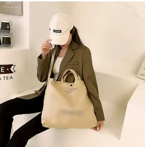 Élégant sac à bandoulière en toile vintage, grand cabas fourre-tout pour les femmes.