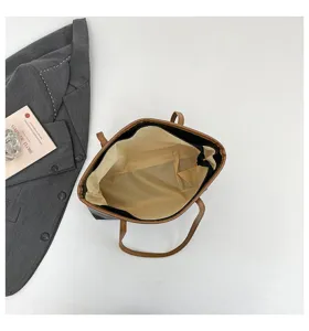 Detailed top-down view of the tote bag interior, showing neat lining and large space.