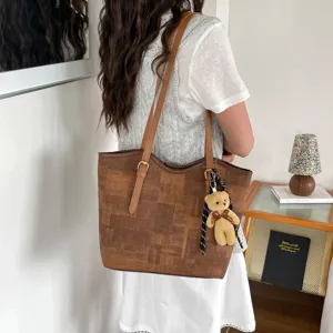 Large capacity commuter shoulder tote bag with vintage plaid pattern and cute teddy bear pendant.