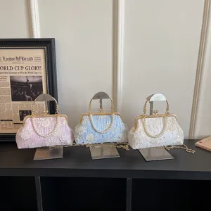 Exquisite vintage lace clutch bag with pearl handle and metal chain for women elegant evening party.