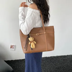 Vintage large capacity brown tote bag, elegant shoulder bag with cute bear pendant for women.
