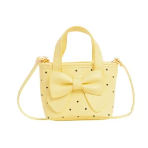Süße gelbe Pünktchen Kinder Umhängetasche mit großer Schleife süße Mini Handtasche