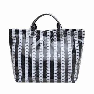 Black glossy tote bag with bow stripe pattern, large capacity daily shoulder handbag.