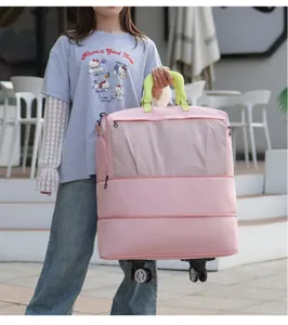 Sac de voyage roulant rose extensible à double couche avec poignée portable pour avion.