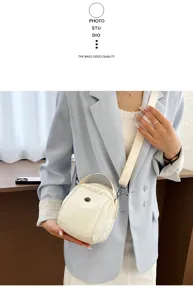 Stijlvolle casual schelp schoudertas met handvat en brede band voor dames dagelijkse mode.