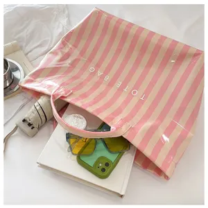 Pink striped PVC tote bag, large capacity casual shoulder bag for summer daily use.