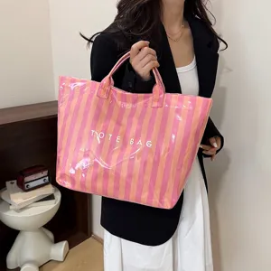 Pink and orange striped PVC tote bag for women, large capacity summer casual shoulder bag.