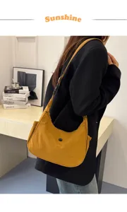 Minimalist nylon underarm shoulder bag for women, casual street trend crossbody bag detail.