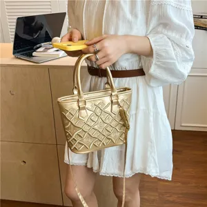 Chic gold embroidered bucket handbag, stylish French style shoulder and crossbody bag for women.