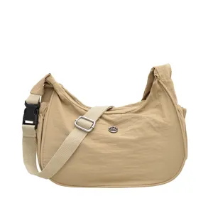 Casual nylon hobo shoulder bag for women, lightweight daily crossbody bag with adjustable strap.
