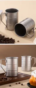 Roestvrijstalen retro industriële koffiekop met handvat, perfect voor buiten kamperen gebruik.