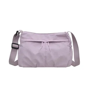 Lightweight purple nylon grid crossbody bag with large capacity for casual daily wear.