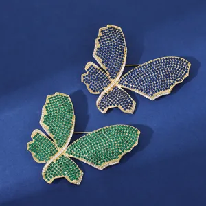 Squisito set di spille a farfalla retrò con zirconi blu e verdi brillanti per giacche eleganti.