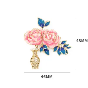 Exquisite enamel peony vase brooch detail, elegant gold-plated floral pin featuring sparkling rhinestones.