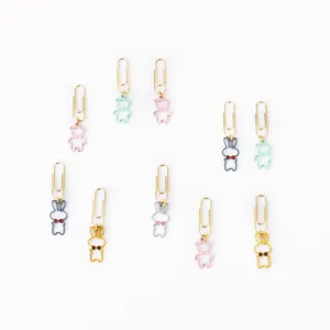 Cute metal paper clips with colorful animal charms like bears and bunnies for office and school.
