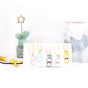 Cute metal paper clips with creative animal pendants, perfect for stationery and office decoration.