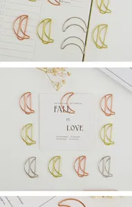 Cute moon shaped metal paper clips, creative colored bookmarks for office and school stationery use.