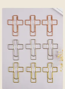 Creative metal cross paper clips and notebook pen holders, practical stationery accessories.