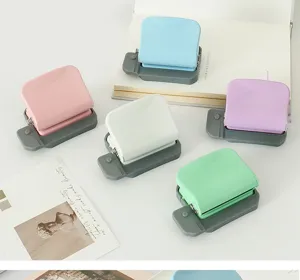 6-hole paper punch for loose-leaf notebooks, mini binder hole puncher for student planners and office.