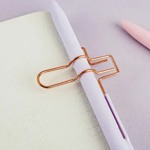 Metal cross pen clip for notebook diary planner, rose gold stationery holder utility tool.