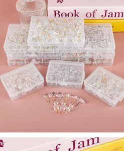 Clear plastic pushpins thumbtacks set in storage box for cork board photo wall decoration