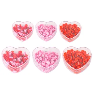 Heart shaped push pins in clear heart cases, colorful plastic tacks for cork board photo wall.