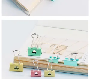 Colorful heart-shaped metal binder clips, cute pastel paper clamps for office and school.