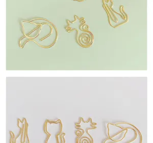 Gold metal cat shaped paper clips, cute creative bookmarks for office files and school stationery.