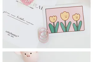 Cute mini pink heart-shaped paper clips, coated PET metal clips for office and school stationery.