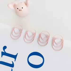 Mini pink heart paper clips, cute coated metal shaped clips for office stationery and school use.