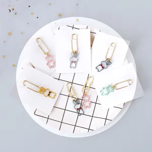 Cute metal cartoon animal paper clips with bunny and bear pendants, ideal for book reading.