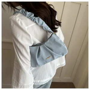 Korean cloud pleated underarm bag for women, stylish niche design shoulder bag with soft handle.
