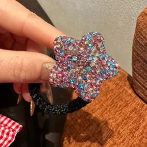 Élastique à cheveux étoile en strass scintillant avec bande noire haute élasticité.