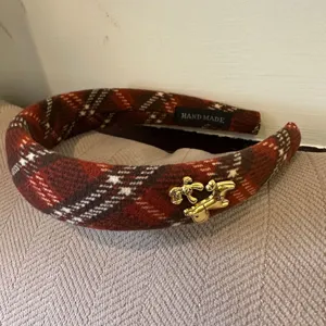 Red plaid headband with gold horse charm, vintage wool winter hair hoop for women.
