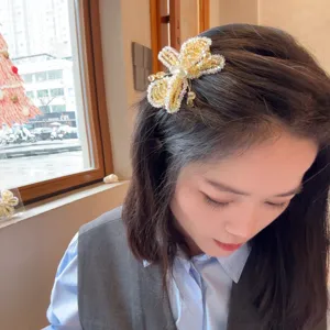 Peigne à cheveux papillon en cristal pour femme élégant accessoire vintage quotidien.