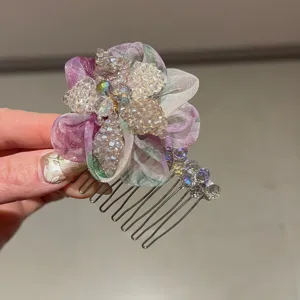 Exquisite crystal flower hair comb detail featuring sparkly beaded petals and metal teeth.