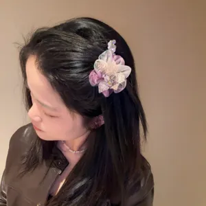 Elegant crystal flower hair clip with sparkling rhinestones, sweet side duckbill design for women and girls.