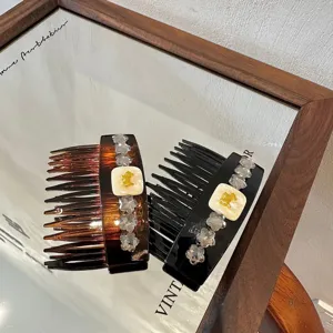 Elegant rhinestone hair comb with cute bear motif, luxury shiny hair accessories for women.