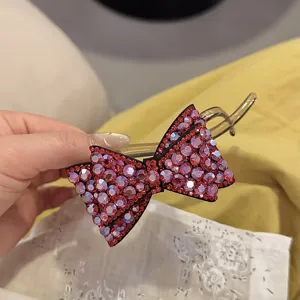 Pince à cheveux élégante nœud papillon en strass étincelant pour coiffure quotidienne.