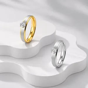 Set de anillos de pareja cepillados de acero inoxidable con diamante solitario para uso diario.