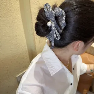 Korean style denim scrunchie with pearl pendant, elegant hair accessory for daily wear.