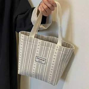 Japanese style striped canvas tote bag casual shoulder handbag for women daily commuting use.