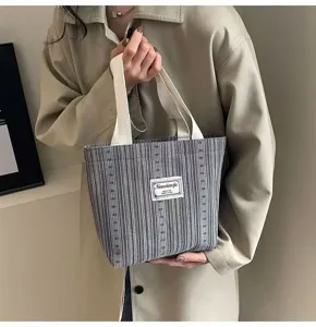 Japanese style striped canvas tote bag for women, casual shoulder handbag for daily commuting.