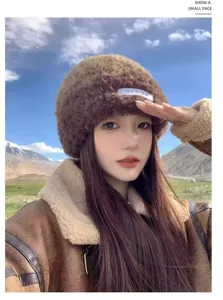 Winter plush warm hat for women, soft cozy fuzzy beanie with earflaps, cute stylish fashion cap.