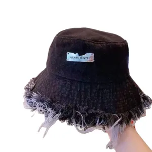 Washed denim bucket hat for women, vintage frayed brim sun hat, casual outdoor fashion cap.