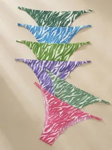 Detail shot of vibrant multi-color zebra print thong underwear, soft fabric, seamless styling.