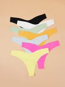 Detail view of seamless low waist solid color thongs, breathable and comfortable design.