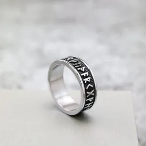 Nordic vintage stainless steel men ring Viking runic engraved ring close-up detail shot