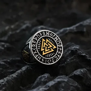 Detail shot of a vintage Nordic stainless steel men's ring featuring Viking Valknut and runes.