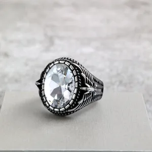 Vintage stainless steel men ring with large oval white stone and detailed bird wing design.